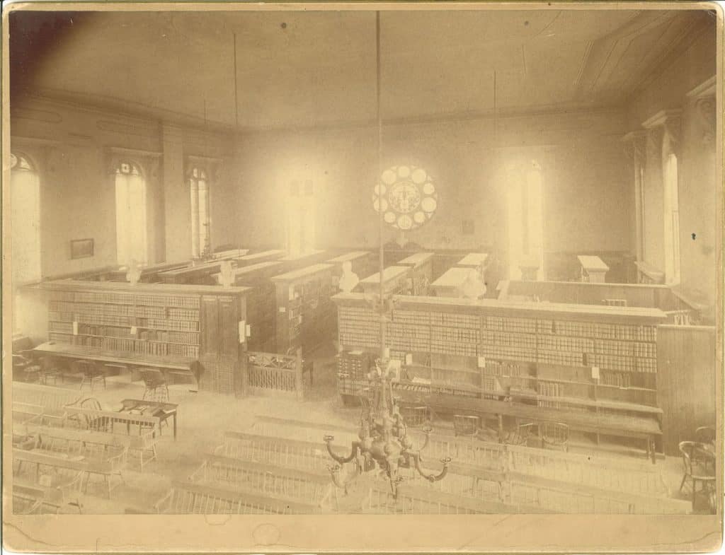Old, sepia-toned image of the library and chapel before the fire in 1897.