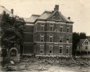 Moving Old Science (later Calvin Hall) across the street, 1904