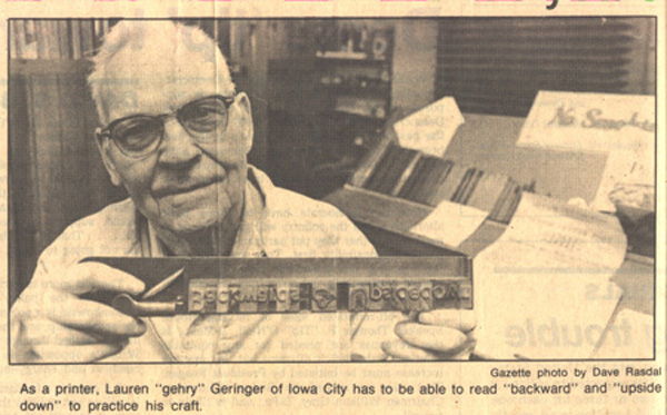 Geringer holding up composing stick