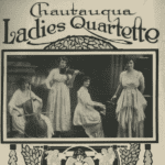 A photo of four women in the early 1900s playing stringed instruments.