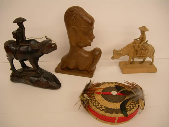 Hand-carved figures, Igorot hat, Caribao
