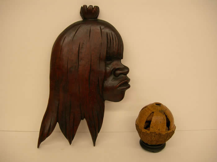 Hand-carved head, carved Brazil nut