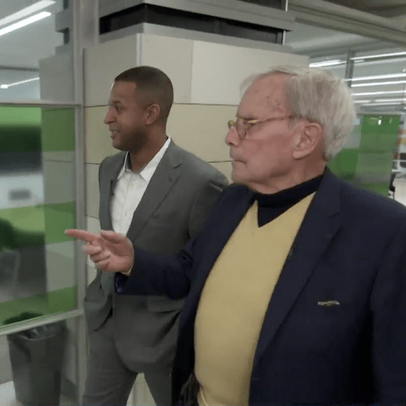 Tom Brokaw with NBC's Craig Melvin at the UI Libraries just before collection opens
